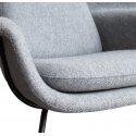 Butaca relax de diseño womb con ottoman tapizado en lana color gris