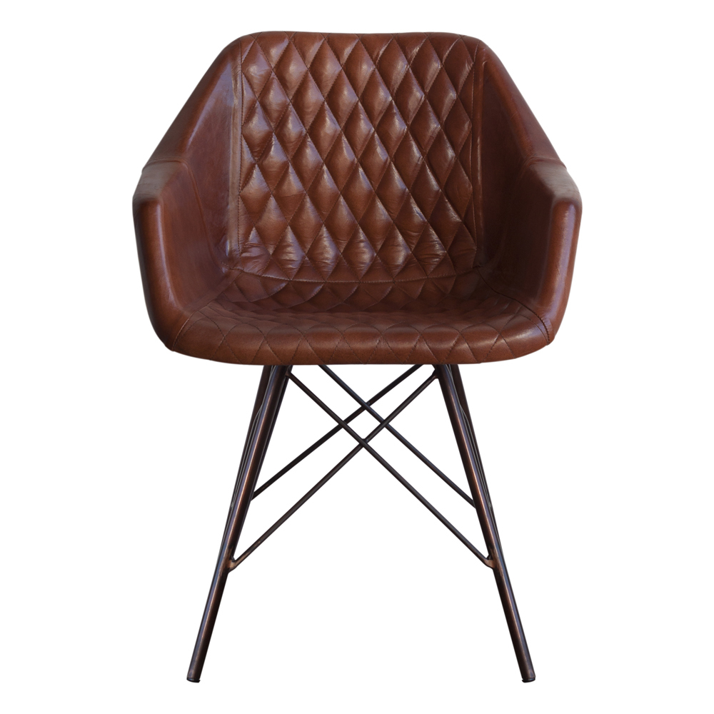 sillón de estilo industrial con asiento de piel